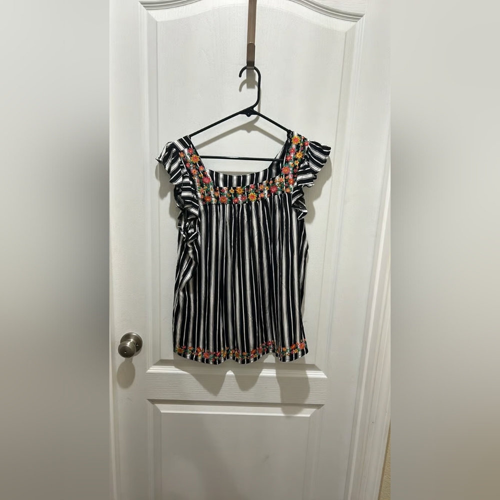 Striped Black and White Women's Top with Floral Accents